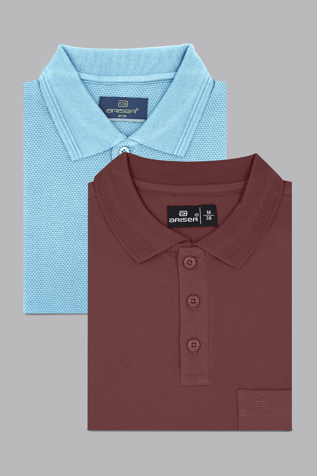 Two folded polo shirts, one blue and one brown, on a gray background.