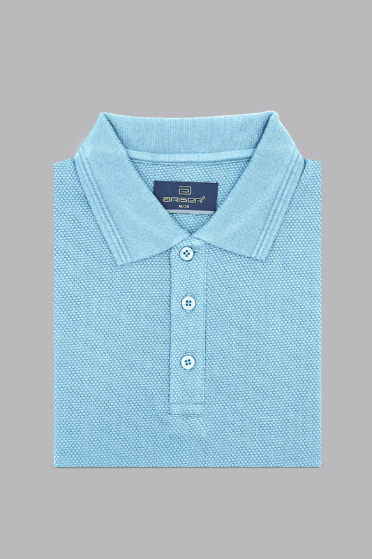 Light blue polo shirt on a gray background