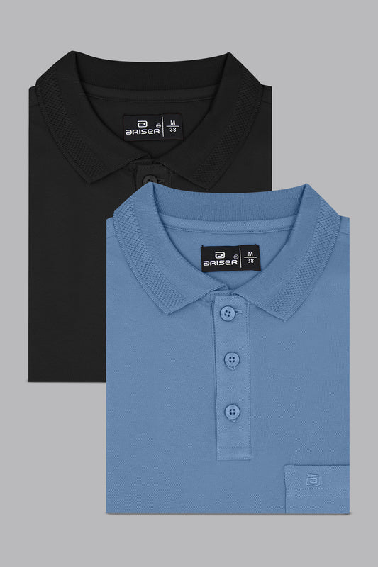 Two folded polo shirts, one black and one blue, on a gray background.