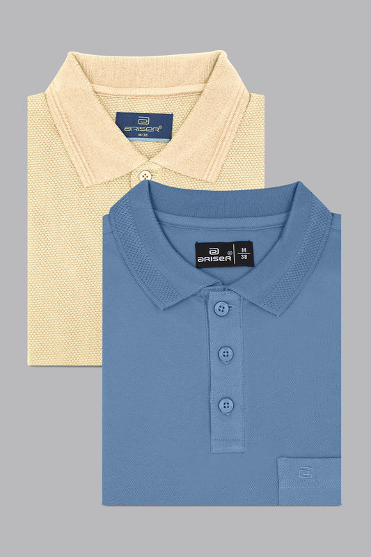 Two folded polo shirts, one beige and one blue, on a gray background.