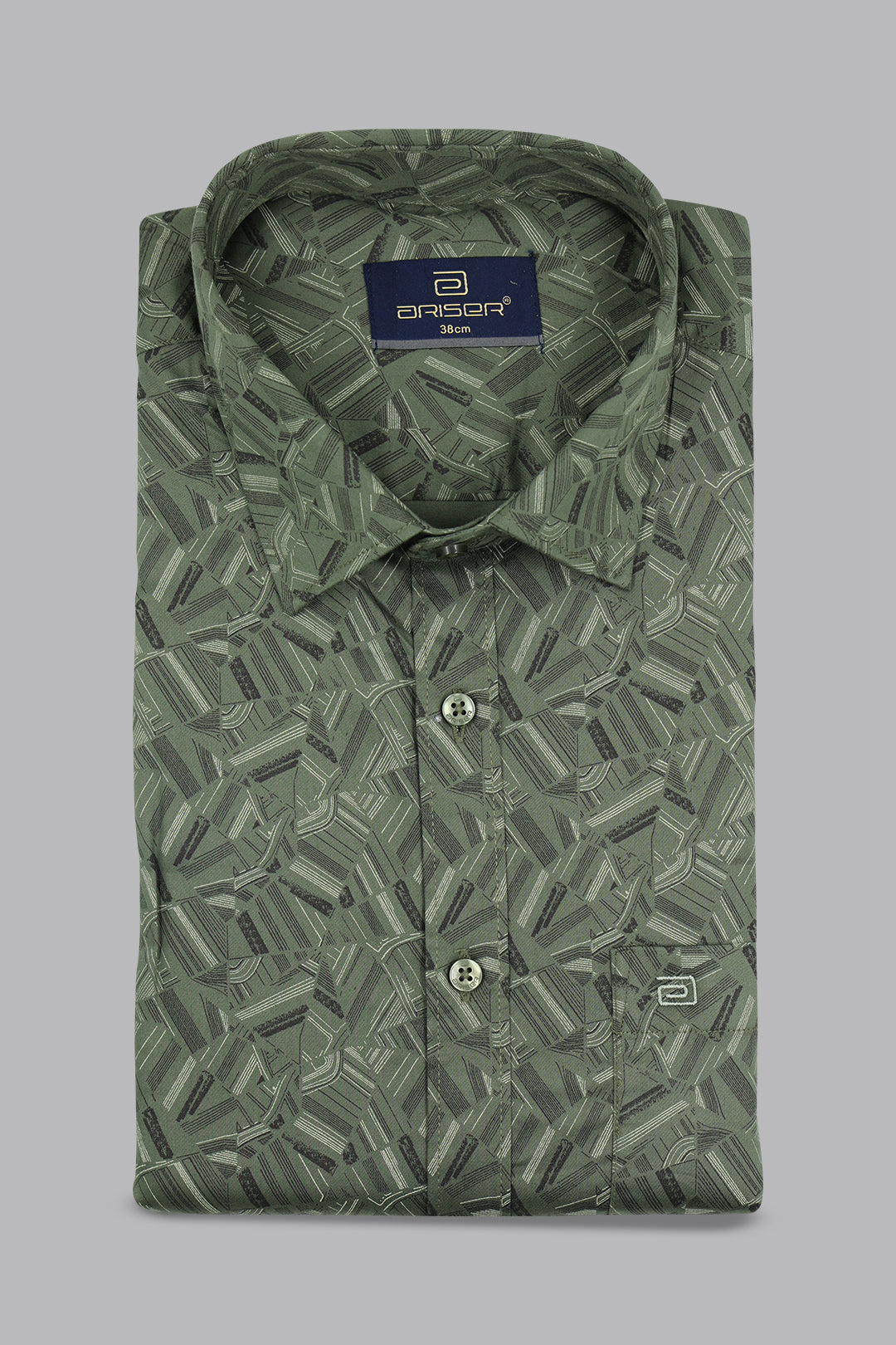 Folded green patterned shirt with a brand label on a gray background