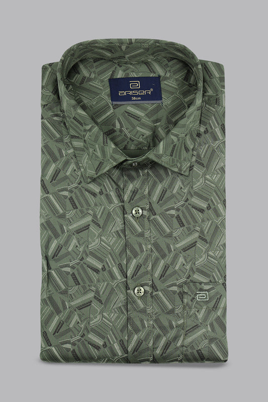 Folded green patterned shirt with a brand label on a gray background