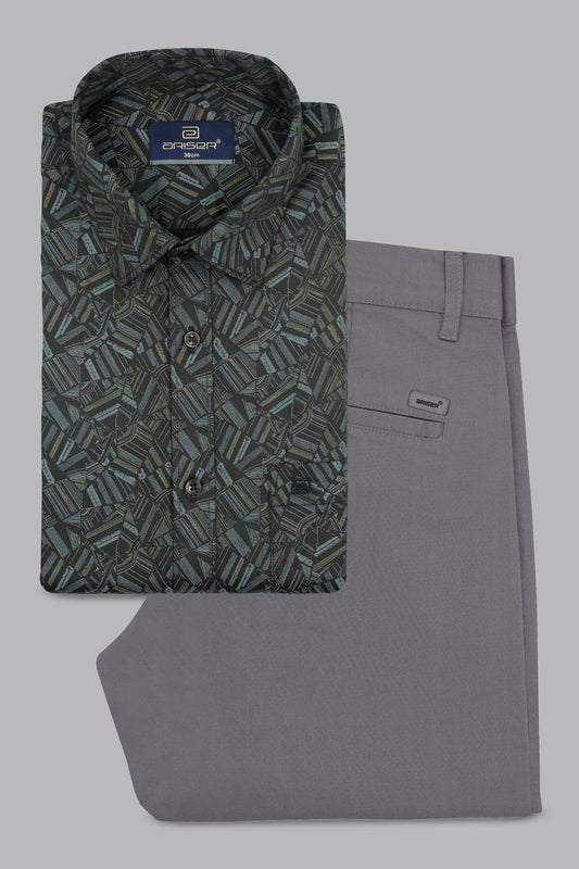 Patterned shirt and gray pants on a gray background
