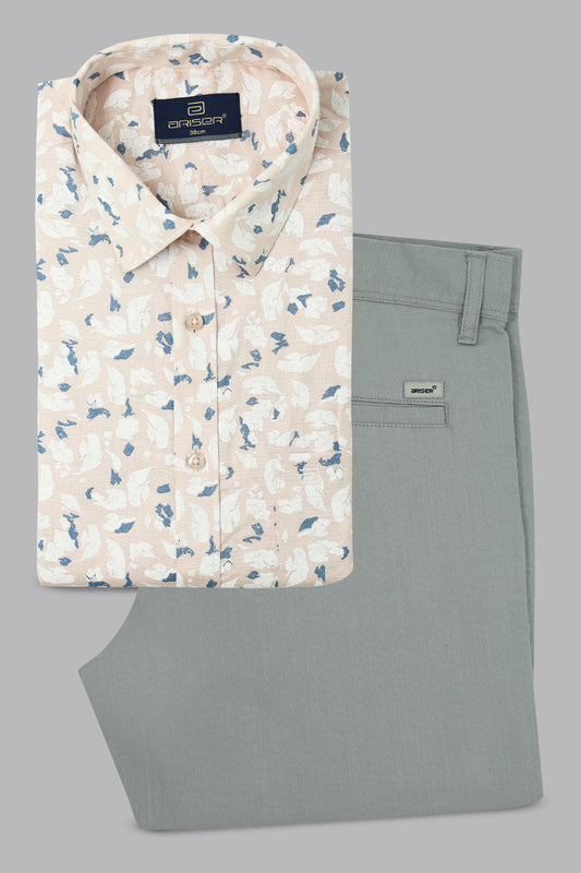 Floral shirt and gray pants on a light gray background