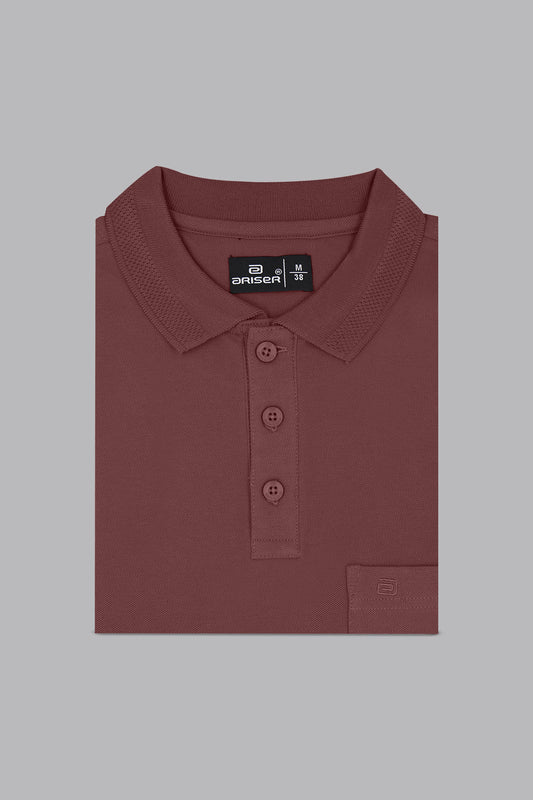 Maroon polo shirt with a brand label on a gray background